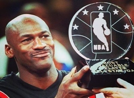 He is holding a Award.